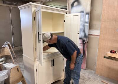 Custom built white cabinet, putting on the finishing touches!!