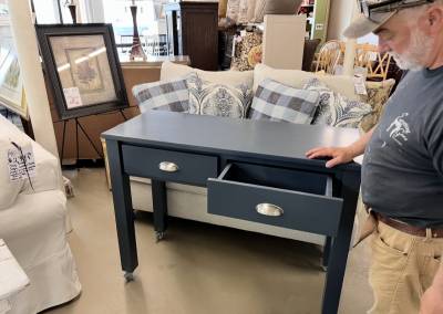 Small island for a very tight kitchen has casters for easy moving