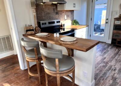 small custom bar and custom counter tops in solid white oak also hand made oak corbel for