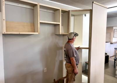 The guys building a custom laundry room