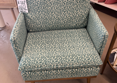 EGF- $399.99 Blue cheetah print mid century modern new order chair.