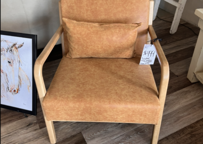 EGF- $499.99 Real leather mid-century modern chair. Can