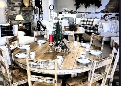 custom made six foot round table and 8 chairs with industrial finish