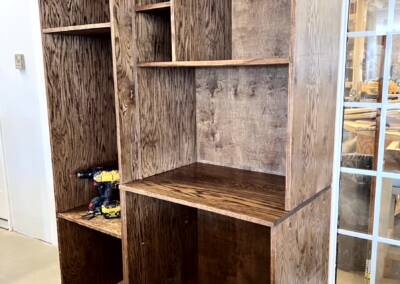custom oak coffee bar to hold mini fridge and microwave etc.