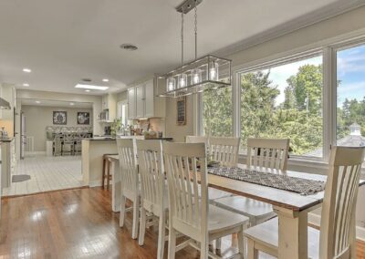 Custom made 9 foot farmhouse table and 8 chairs